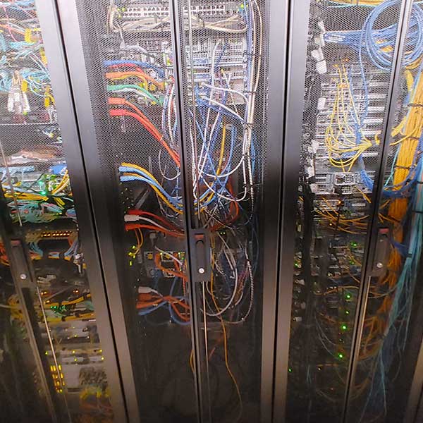 Network cabling and server racks at Sharktech’s Denver data center